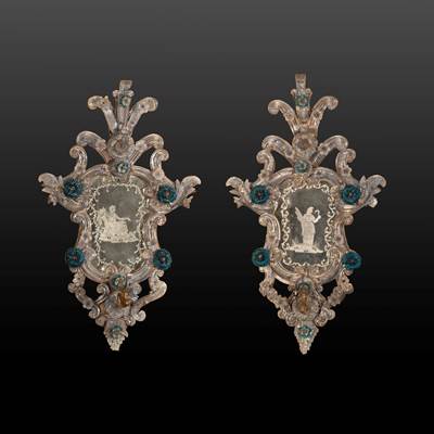 A pair of glass mirrors, with antique engraving characters and iron arms of light, Murano, Venice, circa 1800 (80 cm high, 45 cm wide, 20 cm deep) (31 in. high, 18 in. wide, 8 in. deep)